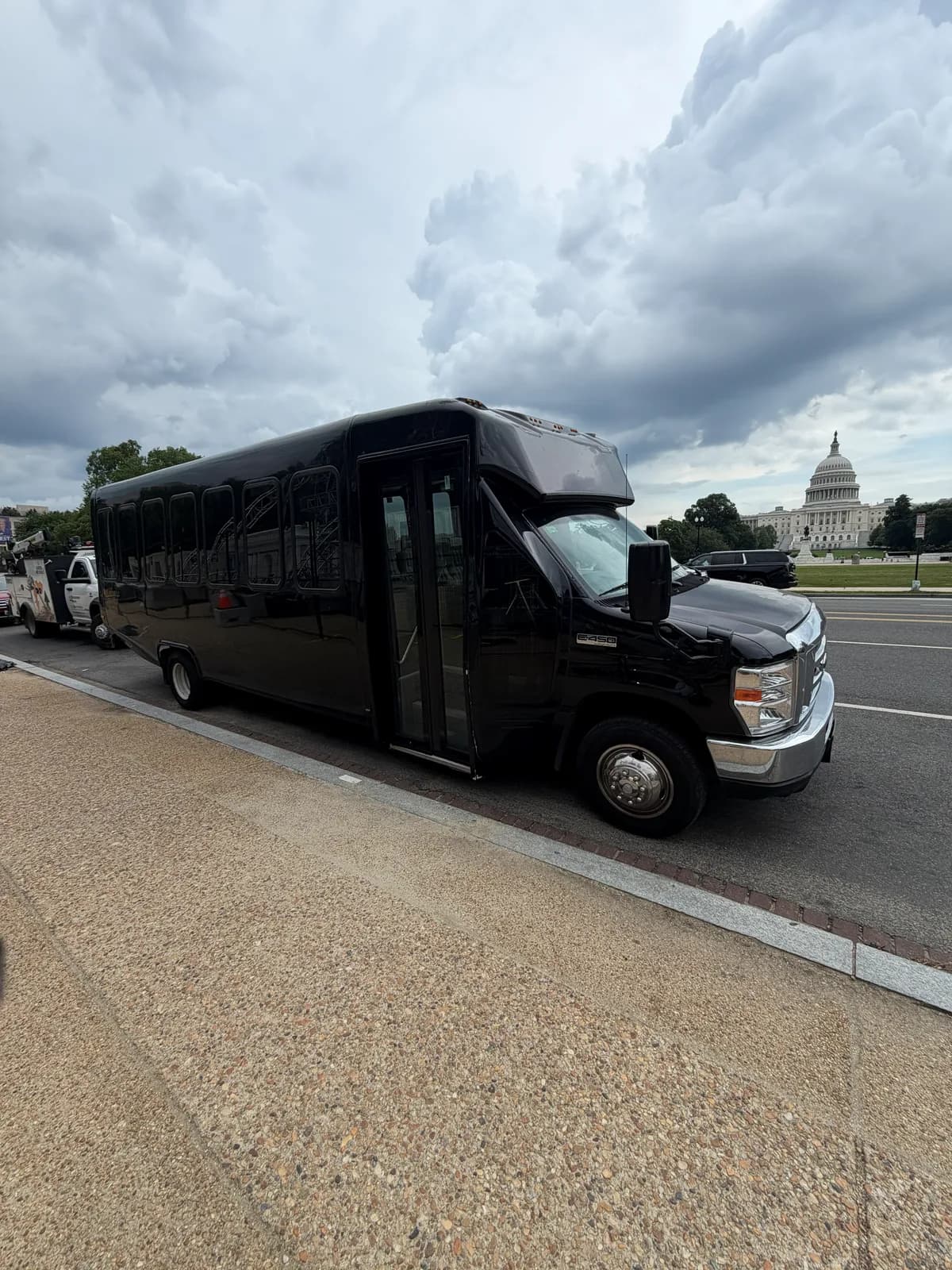 AZA Ford E450 shuttle bus on the street near the US Capitol
