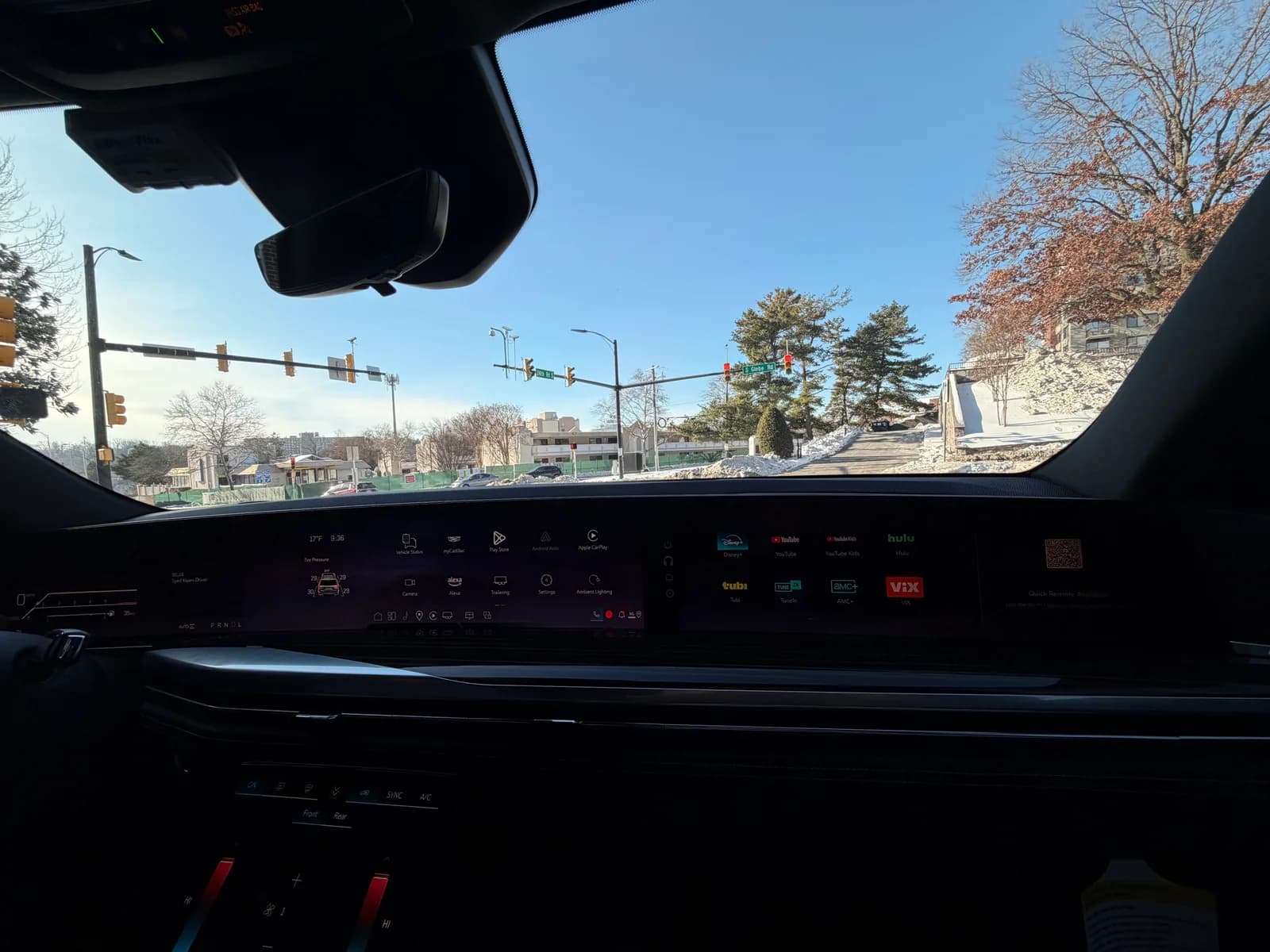 AZA SUV dashboard with CarPlay navigation on a winter route