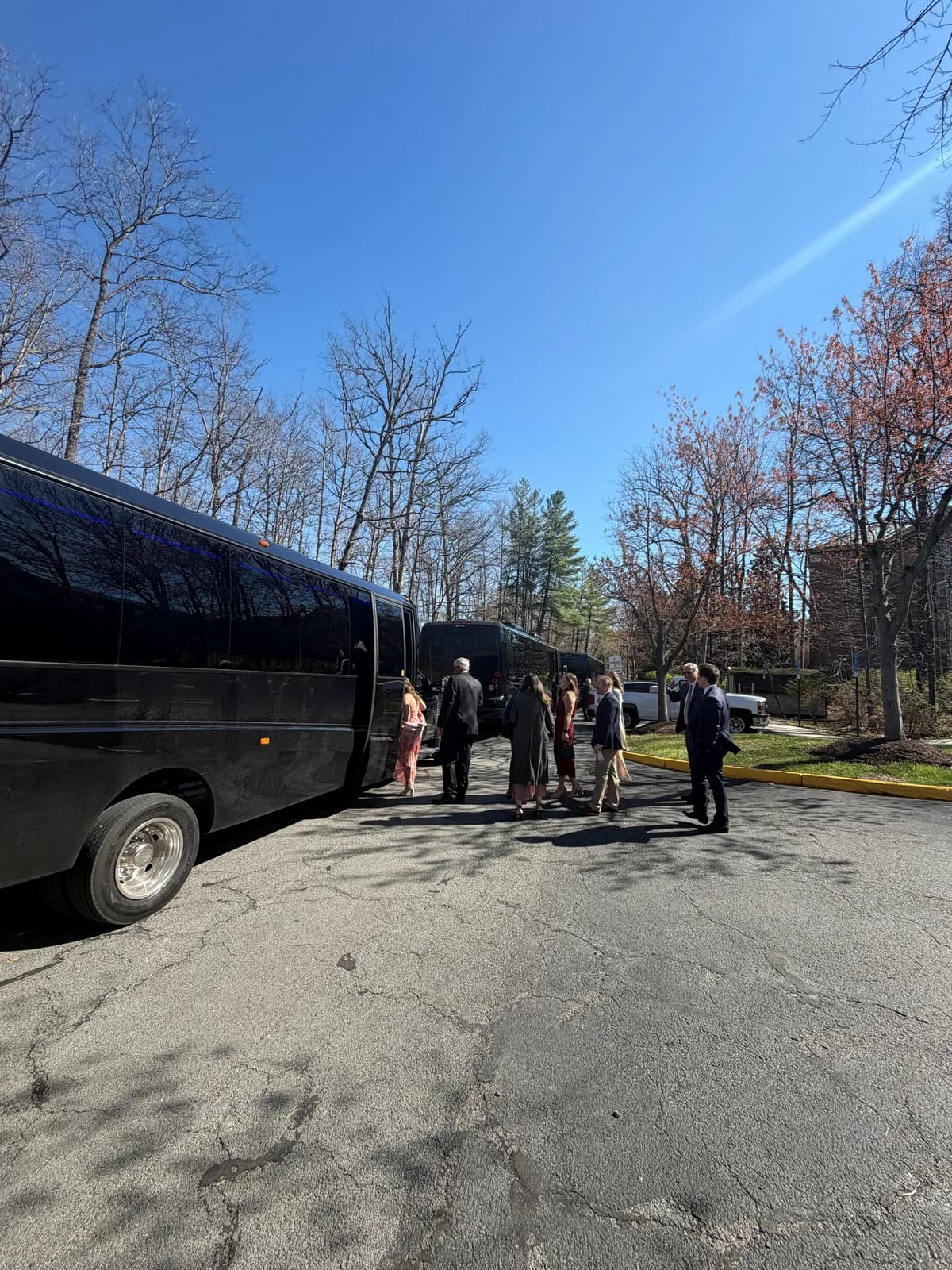 Students boarding an AZA motorcoach for a school field trip