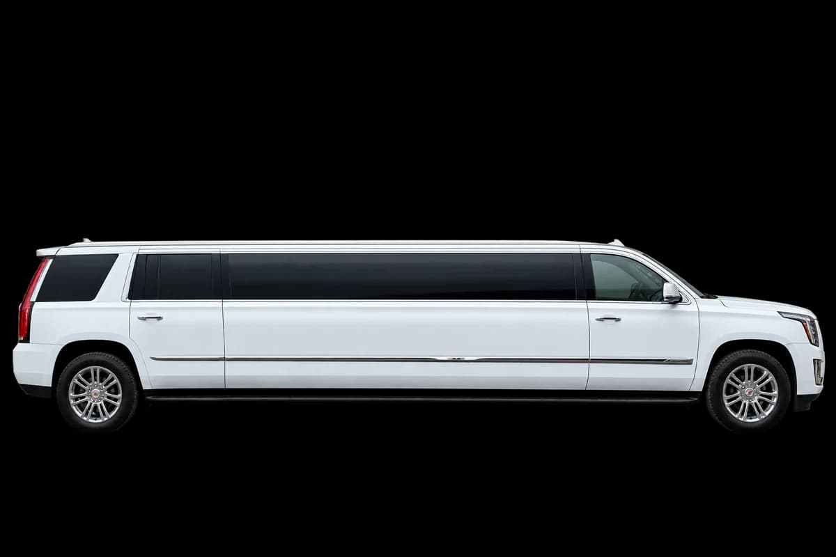 Cadillac Escalade stretch limousine arriving at a wedding venue